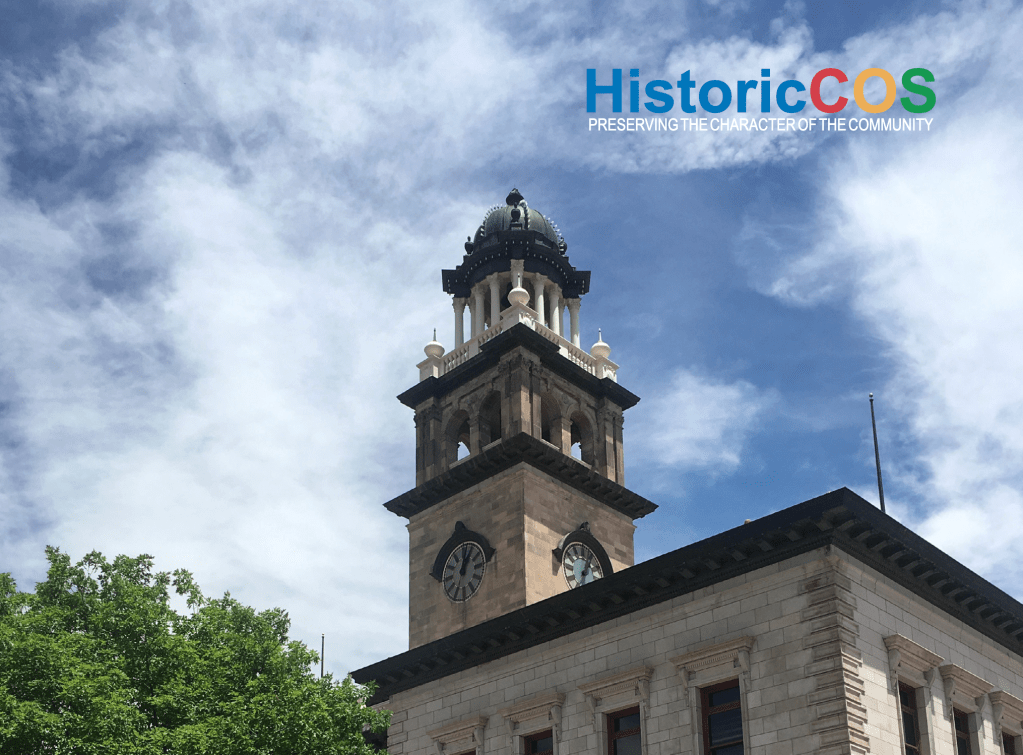 Pioneers Museum in Colorado Springs against a blue sky with white clouds.