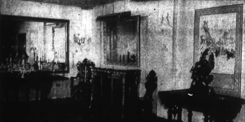 Newspaper image: This is the dining area of the Lefkowsky apartment. The long refectory table at left is identical with the one at right, which is folded. They are 17th century dining tables form the Ambrose Monell collection. At center is a handsome Boulle Credenza with rare African marble top, from the palace of the Prince of Talleyrand, France. The unusual lazy Susan on the table is Sheffield.